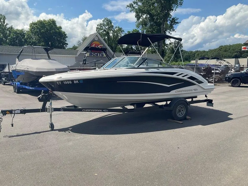 Slide: The Image of 2018 Chaparral 203 VR boat on trailer in sunny outdoor setting. - 8