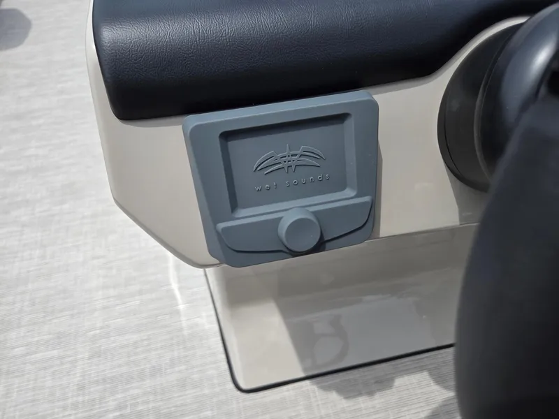 Slide: The Image of Wet Sounds audio control on 2026 Harris Cruiser 230 boat dashboard. - 18