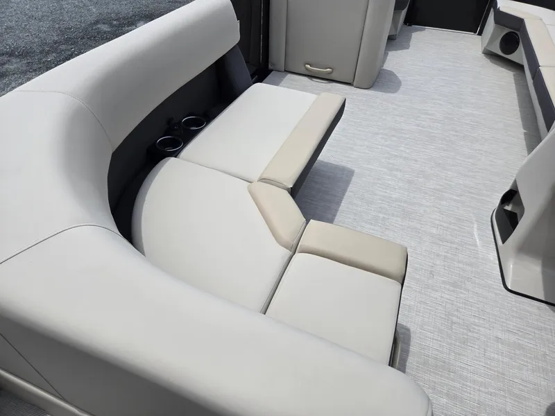 Slide: The Image of Luxurious seating on 2026 Harris Cruiser 230 pontoon boat, featuring cup holders and modern design. - 30