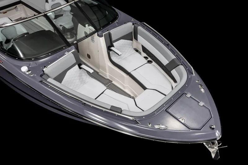 Slide: The Image of 2025 Chaparral 2870 boat with sleek design and spacious seating, viewed from above. - 10