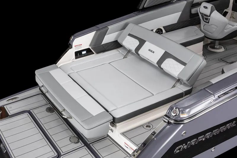 Slide: The Image of 2025 Chaparral 2870 boat interior with gray seating and sleek design. - 5