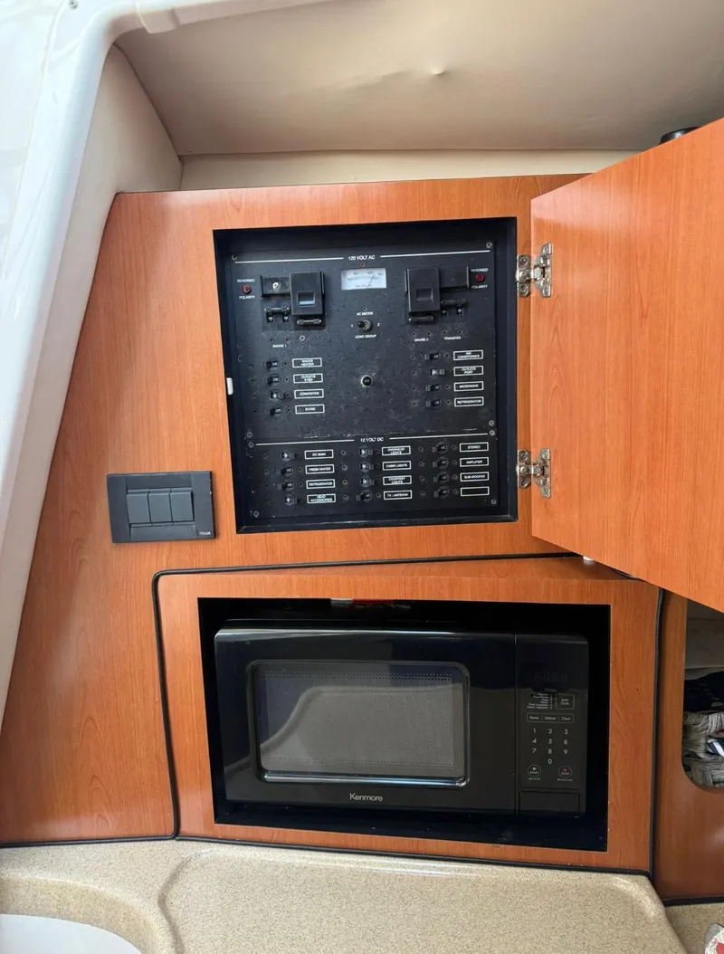 Slide: The Image of 2008 Hydra-Sports Vector 2800 WA interior with control panel and microwave. - 10