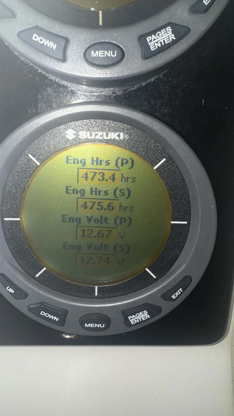 Slide: The Image of Digital display showing engine hours and voltage for a 2008 Hydra-Sports Vector 2800 WA. - 13