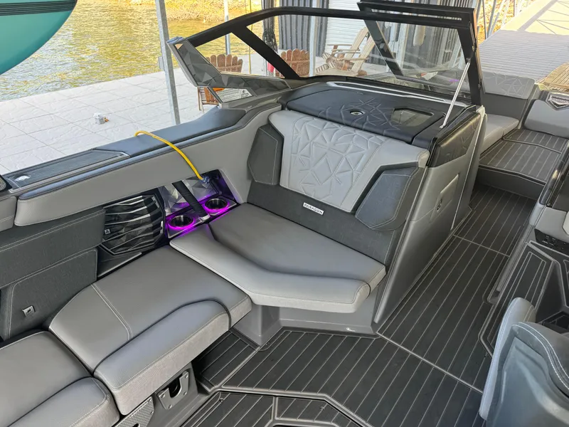 Slide: The Image of 2023 Nautique Super Air Nautique G25 Paragon interior with luxurious seating and modern design. - 11