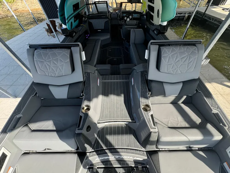 Slide: The Image of 2023 Nautique Super Air Nautique G25 Paragon interior with luxurious seating and modern design. - 15