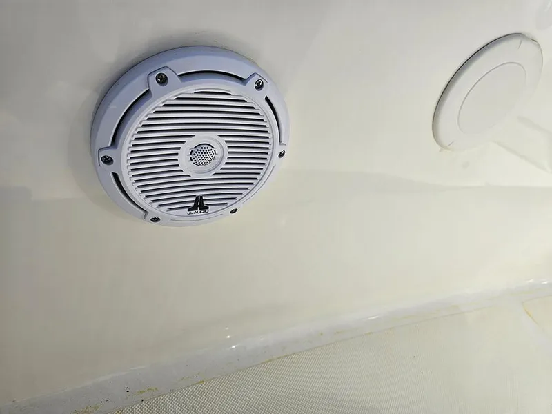 Slide: The Image of Boat speaker on 2025 Pioneer 180 Islander, white interior. - 21