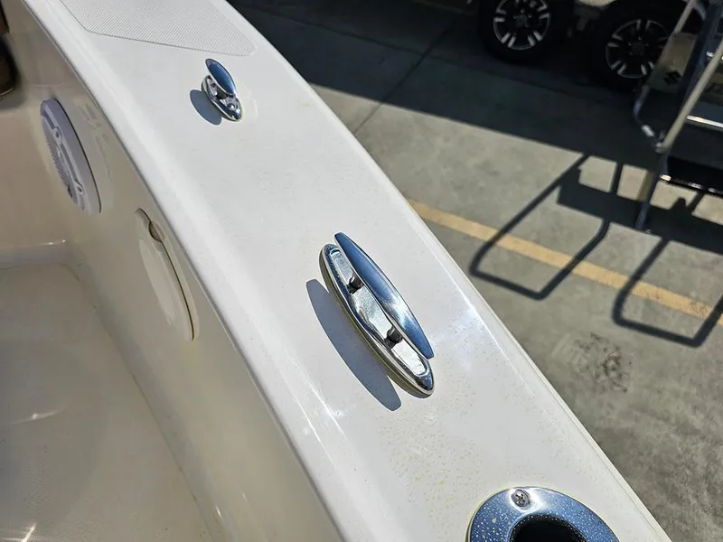 Slide: The Image of 2025 Pioneer 180 Islander boat deck with cleat and speaker detail. - 23