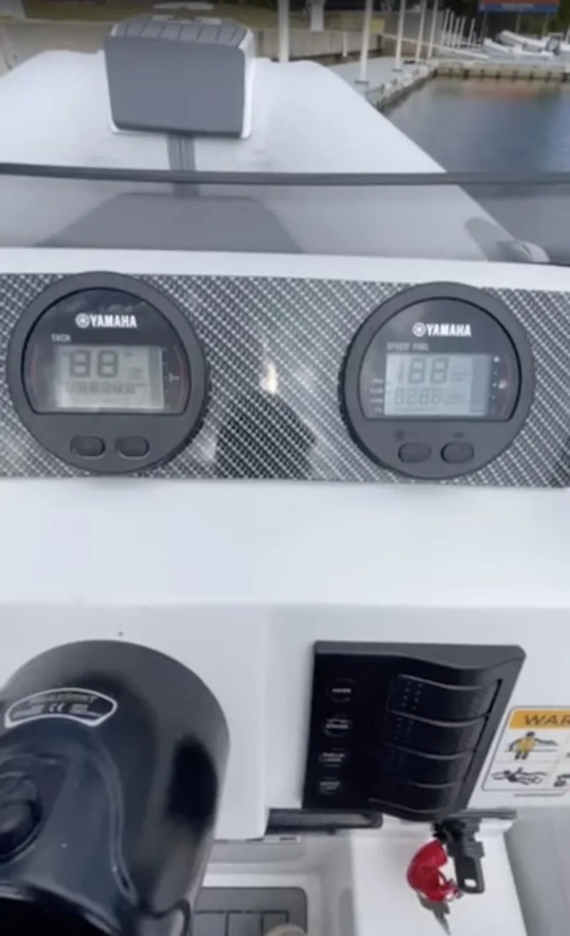 Slide: The Image of Dashboard of 2023 Northstar Axis 3.8 boat with Yamaha gauges and controls. - 6