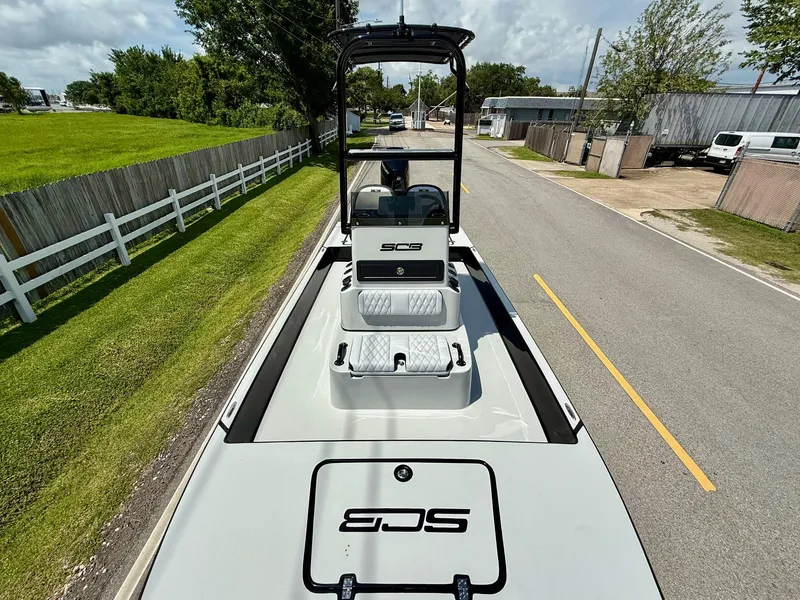 Slide: The Image of 2025 SCB R24 boat on road, showcasing sleek design and modern features. - 15