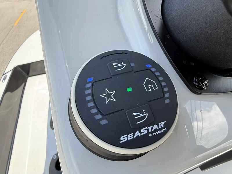 Slide: The Image of 2025 SCB R24 SeaStar control panel by Dometic on boat dashboard. - 17