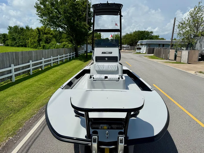 Slide: The Image of 2025 SCB R24 boat on road, showcasing sleek design and modern features. - 6