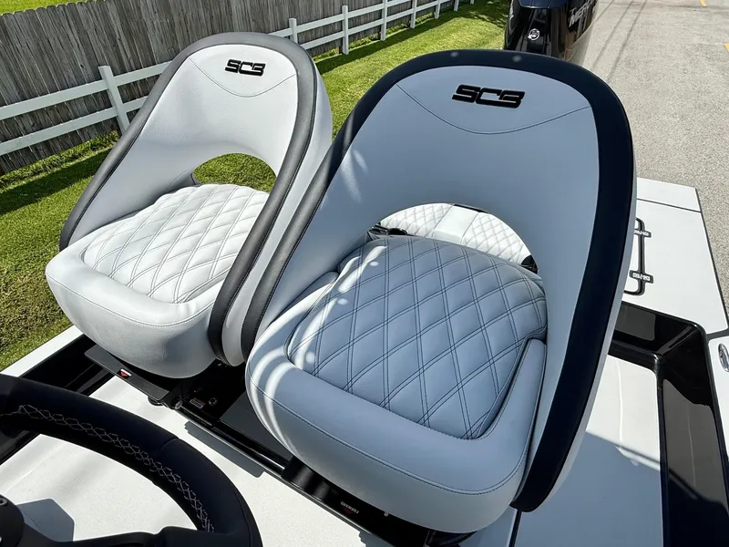 Slide: The Image of Luxury seating on 2025 SCB R24 boat with quilted design and logo. - 9