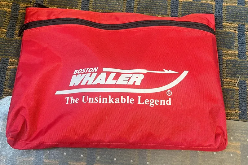 Slide: The Image of Red Boston Whaler bag with "The Unsinkable Legend" slogan, 2005 210 Ventura model. - 32