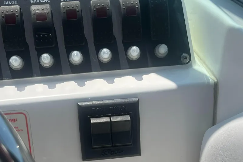 Slide: The Image of Control panel of a 2005 Boston Whaler 210 Ventura boat. - 9