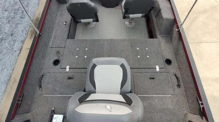 Slide: The Image of 2023 Lowe FM 1775 boat interior with gray seating and carpeted flooring. - 20