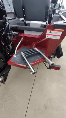 Slide: The Image of 2023 Lowe FM 1775 boat with foldable ladder and seating area. - 24