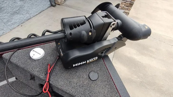 Slide: The Image of Minn Kota trolling motor on 2023 Lowe FM 1775 boat deck. - 7