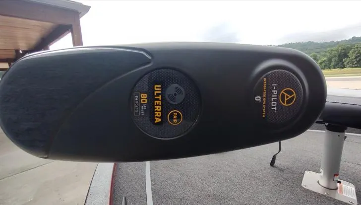 Slide: The Image of Trolling motor head with Ulterra and i-Pilot logos on a 2023 Lowe FM 1775 boat. - 8