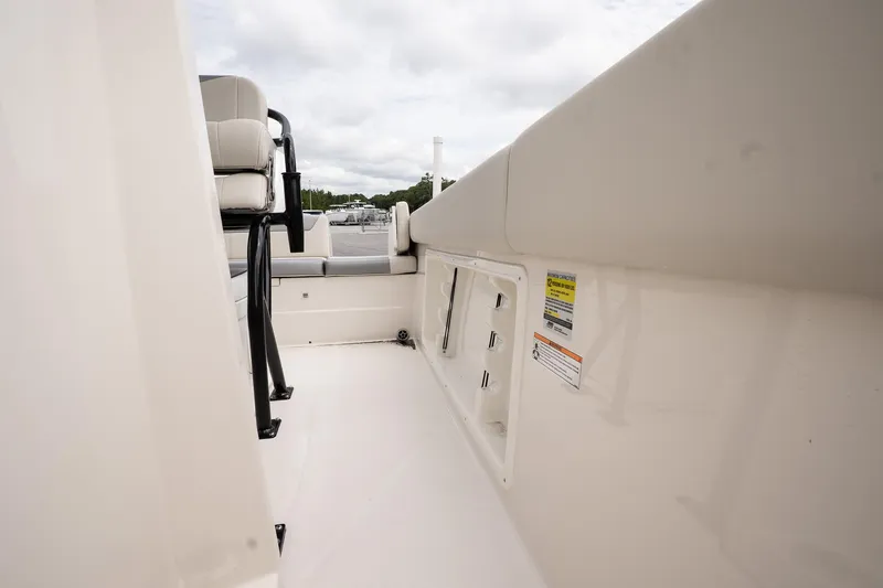 Slide: The Image of 2026 Sailfish 232 CC boat interior with seating and storage compartments. - 20