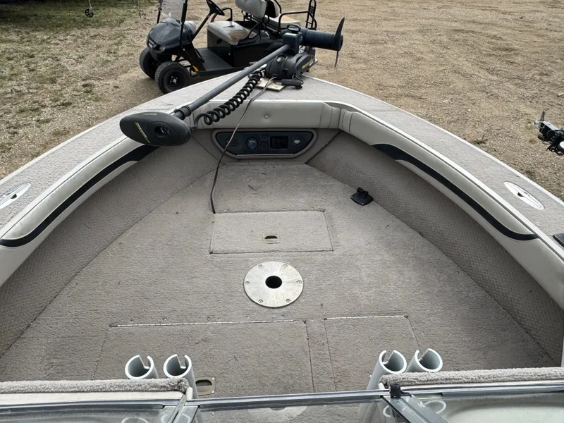 Slide: The Image of Interior view of a 2000 Sylvan 1900 Excursion boat with fishing equipment. - 13