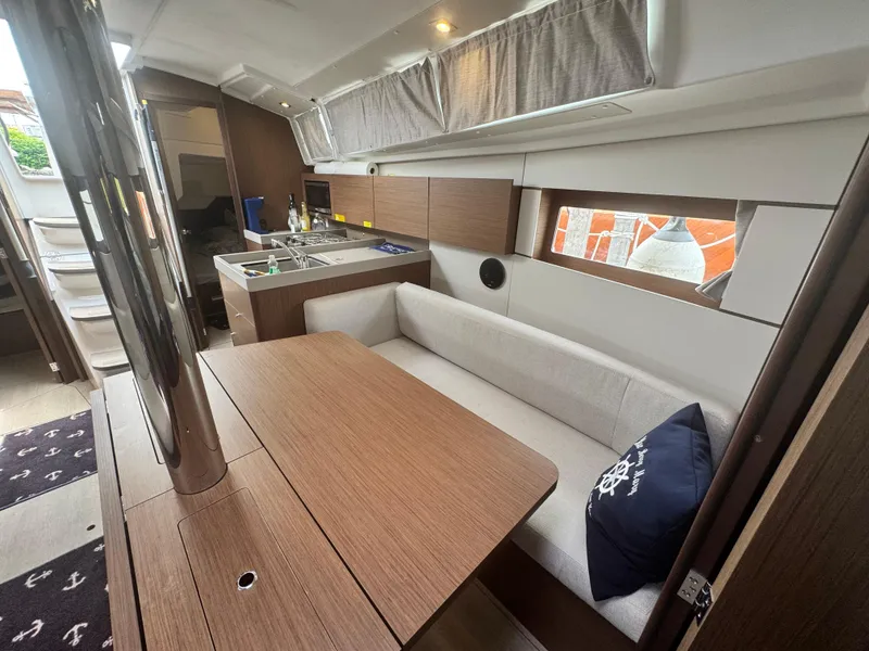 Slide: The Image of Interior of 2023 Beneteau Oceanis 38.1 yacht, featuring modern design and comfortable seating. - 19
