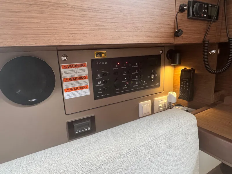 Slide: The Image of Cozy cabin interior of 2023 Beneteau Oceanis 38.1 yacht with comfortable bedding. - 22