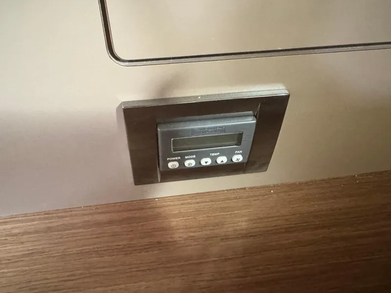 Slide: The Image of Control panel on 2023 Beneteau Oceanis 38.1 yacht, featuring B&G and Fusion systems. - 30