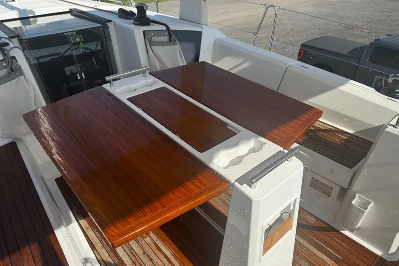 Slide: The Image of 2023 Beneteau Oceanis 38.1 sailboat docked, showcasing sleek design and modern features. - 34