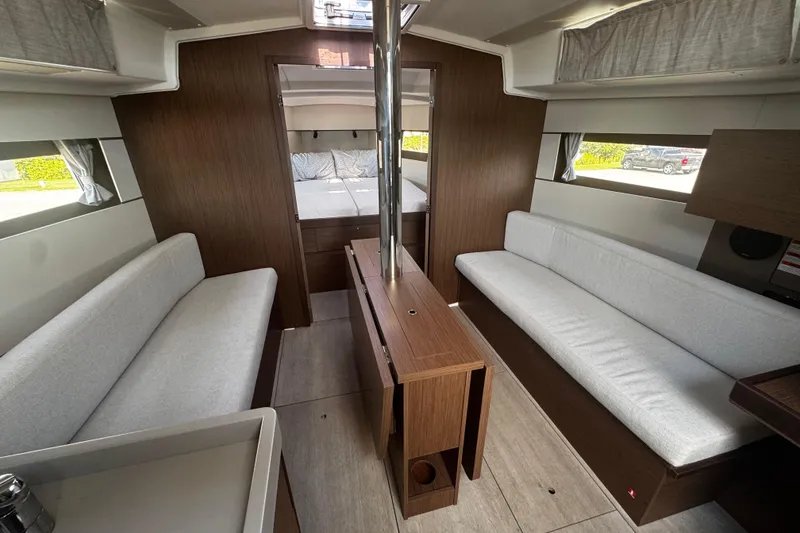 Slide: The Image of 2023 Beneteau Oceanis 38.1 cabin with double bed and modern interior design. - 41
