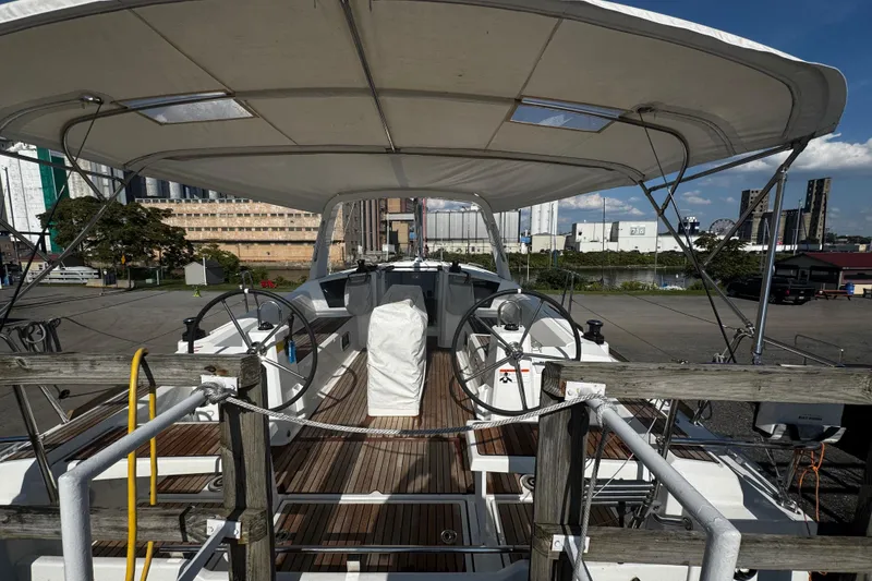 Slide: The Image of Engine compartment of 2023 Beneteau Oceanis 38.1 sailboat, showcasing mechanical components. - 50