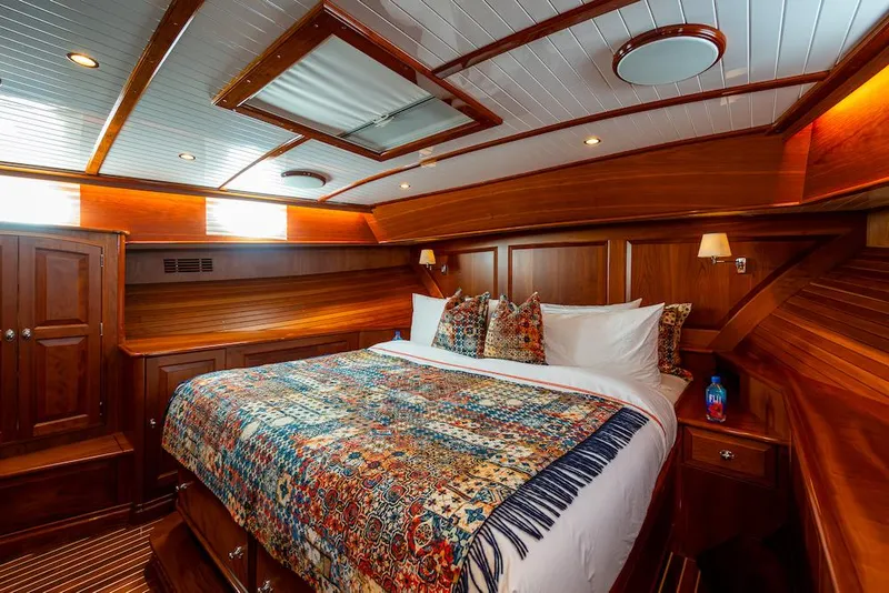 Slide: The Image of Luxurious cabin interior of 2021 Hinckley Talaria 55 Flybridge MKII yacht with elegant wood finish. - 31