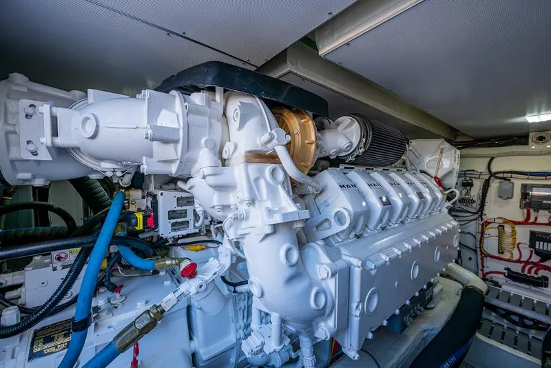 Slide: The Image of Engine room of 2021 Hinckley Talaria 55 Flybridge MKII yacht, showcasing advanced machinery. - 39