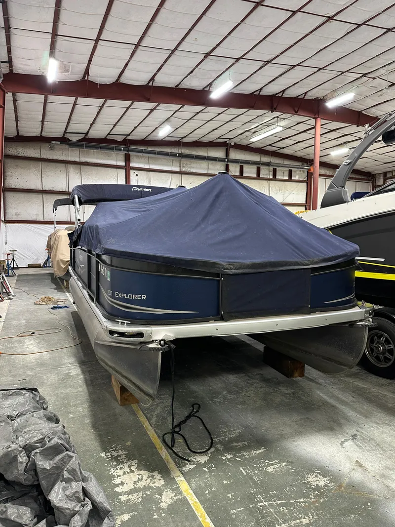 The Image of 2014 Premier 201 Explorer pontoon boat covered in storage facility. - 0