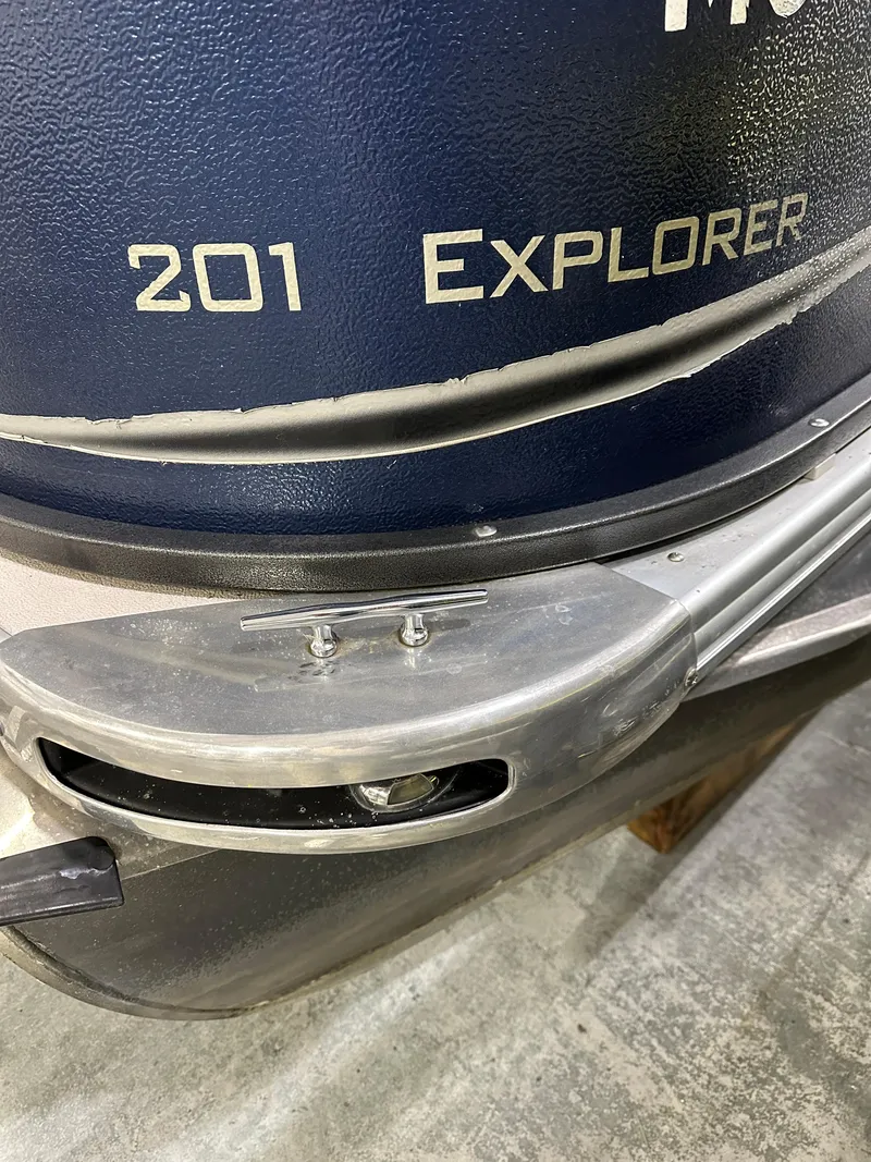 Slide: The Image of 2014 Premier 201 Explorer boat detail with metallic finish and model name visible. - 4