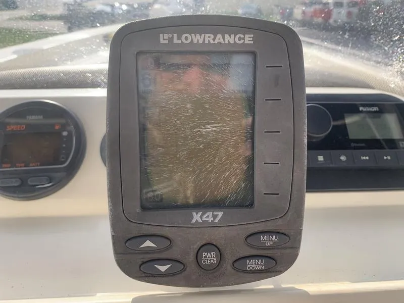 Slide: The Image of Lowrance X47 fishfinder on 2003 Scout 177 Sportfish boat dashboard. - 15