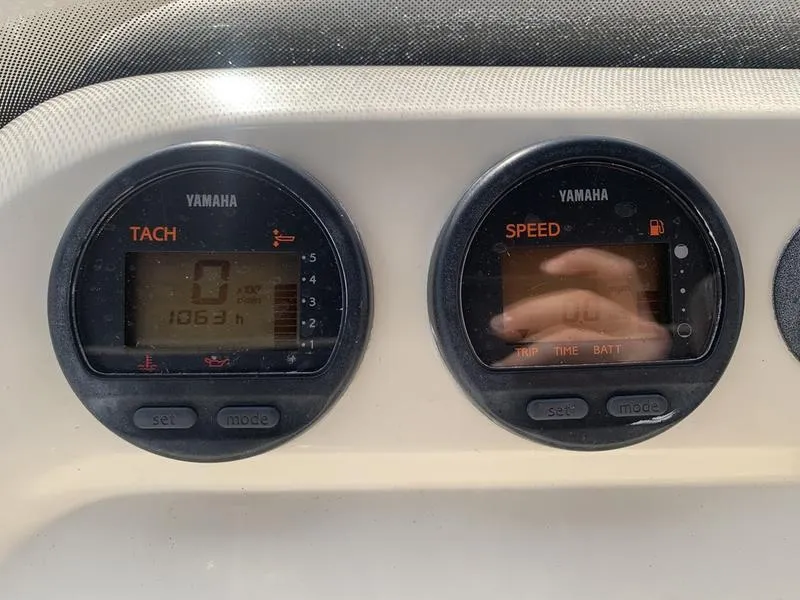 Slide: The Image of Yamaha tachometer and speedometer on 2003 Scout 177 Sportfish boat dashboard. - 16