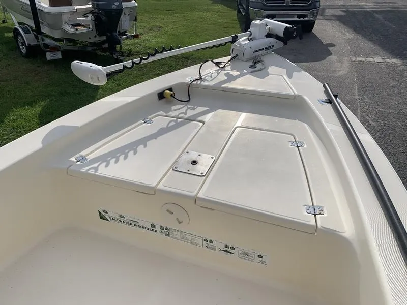 Slide: The Image of 2003 Scout 177 Sportfish boat with trolling motor on deck. - 17