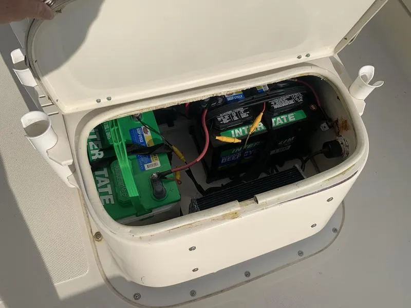 Slide: The Image of Open battery compartment on 2003 Scout 177 Sportfish boat, showing Interstate batteries. - 20