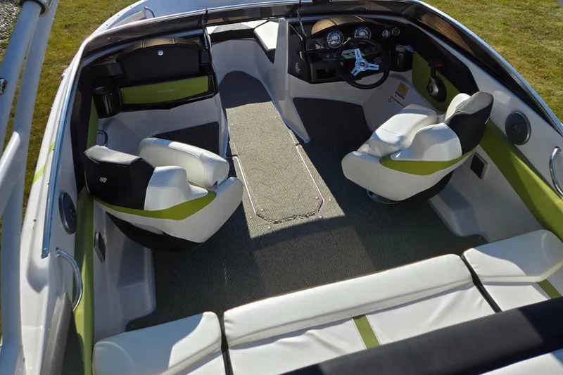 Slide: The Image of Interior of 2013 Four Winns H190RS boat with modern seating and dashboard. - 14
