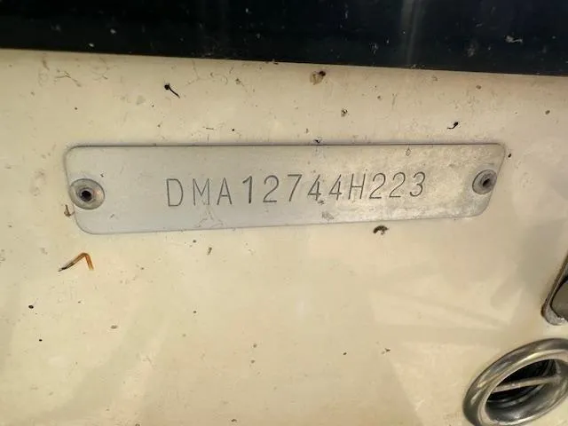 Slide: The Image of 2023 Edgewater 230CX boat identification plate with serial number DMA12744H223. - 15
