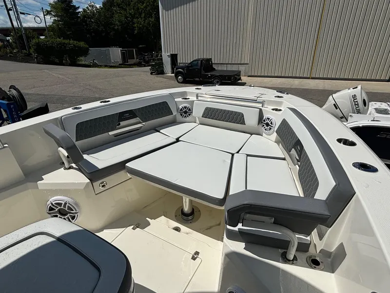 Slide: The Image of 2025 Cobia 265 Center Console boat with spacious seating and modern design. - 10