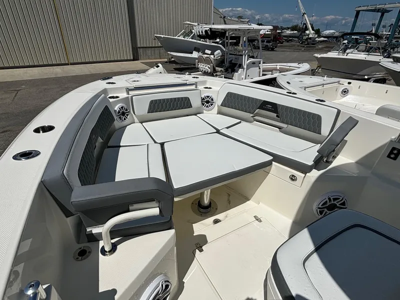 Slide: The Image of 2025 Cobia 265 Center Console boat with spacious seating and modern design. - 11