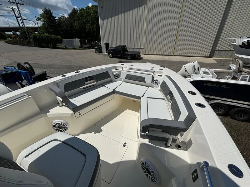 Slide: The Image of 2025 Cobia 265 Center Console boat with spacious seating and modern design. - 8