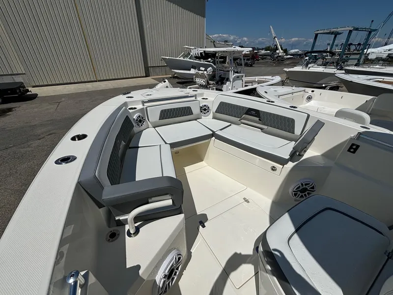 Slide: The Image of 2025 Cobia 265 Center Console boat with spacious seating and modern design. - 9