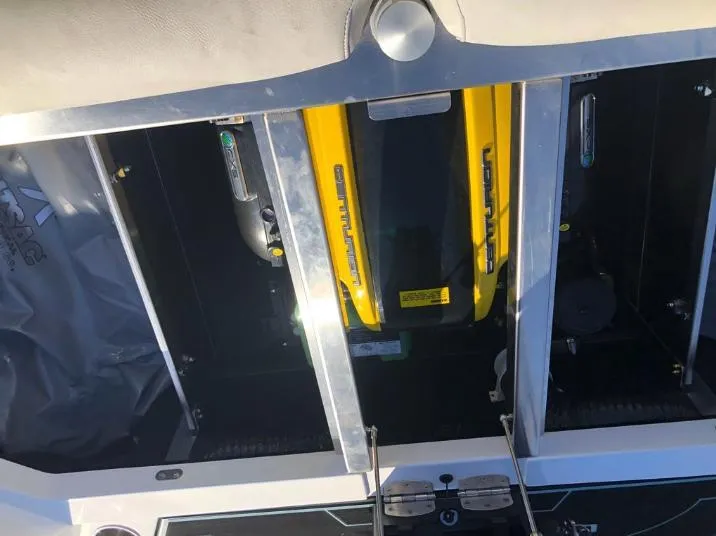 Slide: The Image of 2022 Centurion Ri 230 engine compartment with yellow accents and metal framework. - 10