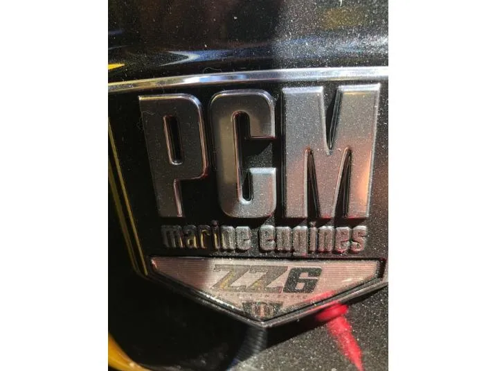 Slide: The Image of PCM marine engines logo on 2022 Centurion Ri 230 boat. - 13