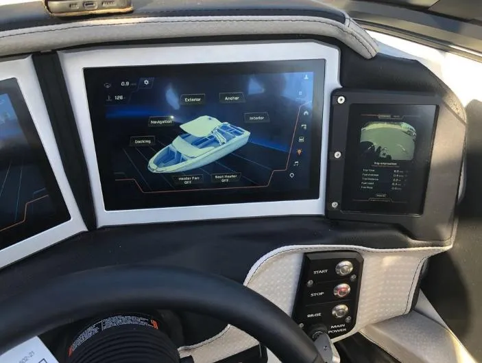 Slide: The Image of Dashboard of a 2022 Centurion Ri 230 boat with touchscreen controls. - 20