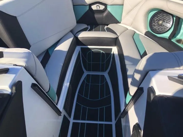 Slide: The Image of Interior of 2022 Centurion Ri 230 boat with stylish seating and speaker system. - 31