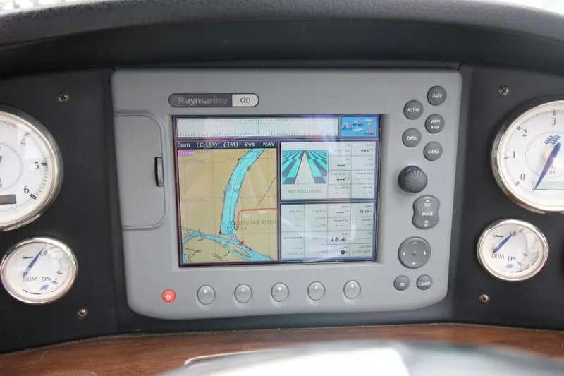 Slide: The Image of Dashboard of 2008 Four Winns V338 with Raymarine C80 navigation system. - 17