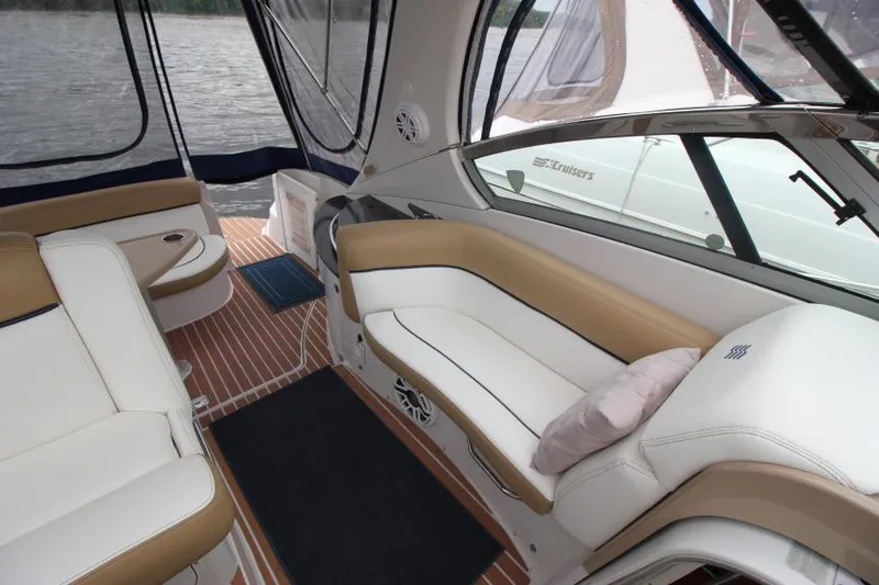 Slide: The Image of Interior of 2008 Four Winns V338 boat with beige and white seating. - 19